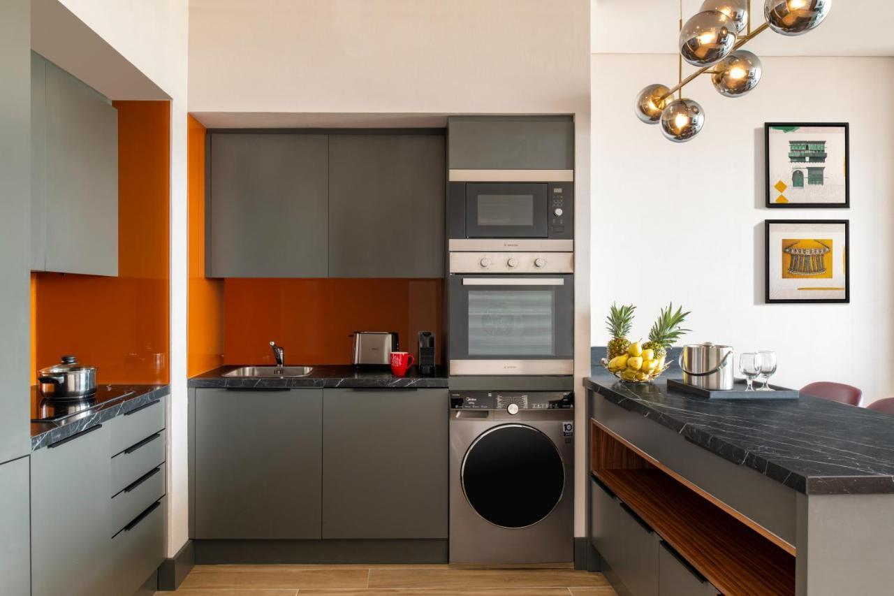 Swissotel Living Jeddah Ngoại thất bức ảnh A typical kitchen in a serviced apartment